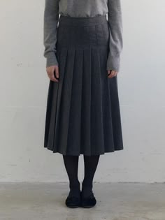 This renewed wool pleated skirt from FABRICOLOGY's Winter 2024 collection combines comfort and sophistication with its soft wool blend fabric and classic pleated design. The charcoal-colored skirt features a side zipper closure, full lining, and moderate pleats that fall to a flattering 77.5cm length, making it a versatile wardrobe staple. The standard fit and comfortable blend of polyester, wool, rayon, and spandex ensures both warmth and wearability, while maintaining a polished silhouette sui Grey Midi Skirt, Wool Pleated Skirt, Long Pleated Skirt, Donna Tartt, Pleated Long Skirt, Versatile Wardrobe, 2025 Fashion, Wool Skirt, Gray Skirt