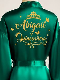 Make a statement at your Quinceañera with this stunning Green with Gold robe, designed to make you feel like royalty. Featuring luxurious green fabric and elegant gold accents, it's the perfect blend of sophistication and style. Plus, it's fully personalized, allowing you to add your name or special date for a truly unique touch. Includes : RobeAll the items are hand-made.Can be personalized with name and date of your celebration.We can decorate this set with any color or text you want. Money Card Box, Quinceanera Bouquet, Quinceanera Tiaras, Cake Knife Set, Quinceanera Cakes, Money Cards, Tiaras And Crowns, Green Fabric, Quinceanera