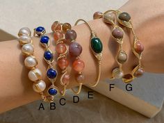 Stone: Freshwater pearl, Lapis Lazuli, Red Agate, Malachite, Alashan Agate, Amethyst with gold filled wire detail SIZE:  one size, fits 15-16cm wrist  Closure: - fixed open end, the band is stretchable  17cm at max suggested. if you're not sure about the sizing, feel free to send me a DM I'm happy to help Wire Wrapped Jewelry Bracelets, Gold Wire Wrapped Beaded Bracelets For Healing, Bohemian Adjustable Wire Wrapped Bangle, Handmade Bohemian Bangle As Gift, Wire Wrapped Gold Bracelets For Festival, Gold Wire Wrapped Bracelets For Festivals, Gold Wire Wrapped Bracelet For Festival, Bohemian Bangle With Natural Stones As Gift, Bohemian Bangle As A Gift With Unique Variations