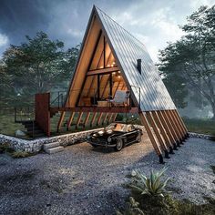 a car is parked in front of a triangular shaped house that has been built into the ground