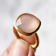 D E T A I L S - Material: 925 Sterling silverStone: Pink ChalcedonyThe fit: True to US ring size Finish: Textured and Gold Plated to a high shineS H I P P I N G & P R O D U C T I O N - My current production time is 2-6 business days, which means after those days are up, your order ships! I make everything custom to order, by hand, but I promise you it's worth the wait!R U S H - M Y - O R D E R -If you're in a rush to get your pretty new pieces, please send me a message and I'll let you know Gold Chalcedony Jewelry For Anniversary, Yellow Gold Chalcedony Ring Gift, Adjustable Chalcedony Jewelry For Anniversary, Chalcedony Rings Fine Jewelry For Gift, Modern Chalcedony Rings For Gift, Elegant Pink Moonstone Sterling Silver Ring, Fine Jewelry Chalcedony Wedding Jewelry, Handmade Gold Chalcedony Rings, Elegant Moonstone Ring With Large Stone For Wedding