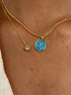 You’ll always be on island time with this best seller! This handmade necklace features a gorgeous turquoise anchor pendant on a gold plated satellite chain. Wearing this necklace is guaranteed to make you feel like you're out on the water on a sunny day! The gold satellite chain adds a simplistic touch with a pop of rich sparkling turquoise to bring it all together. The layering options are endless with this necklace. Wear it by itself as a statement piece, or layer with more gold and blue toned Hawaii Trip, Anchor Pendant, Gold And Blue, Pendant Gold, Hawaii Travel, Round Pendant, Summer Jewelry, Handmade Necklace, Accessories Necklace