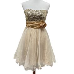 Studio Y Gold Sequined Strapless Dress! Champagne Tulle W/Glitter. Size 7/8. New With Tags From Maurices. Never Worn. Strapless. Very Sparkly And Shimmery. Lined. Flowy Fit And Flare Style Dress. Two Layers Of Tulle, And The Top One Has Glitter. Gold Sequin Bodice. Elastic Along The Top So It Can Fit A Variety Of Sizes Comforta. Attached Satin Belt / Sash. Materials: Shell 100% Polyester. Contrast 100% Nylon Lining 55% Polyester, 45% Lining Please Review Pictures To See Specific Condition, And L Dresses Gold, Satin Belt, Dress Champagne, Fairy Aesthetic, Glitter Gold, Gold Sequin, Gold Dress, Soft Girl, Rose Color