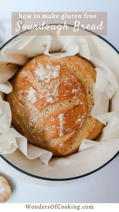 a loaf of bread sitting in a bowl on top of a table