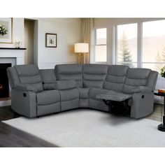 a living room with a large gray sectional couch