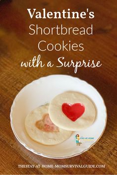 valentine's shortbread cookies with a heart on top and the words, valentine's shortbread cookies with a surprise