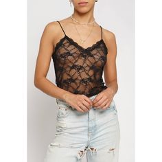 A wardrobe essential, this lace v-neck cami top is the perfect way to update your look! Add some subtle elegance and style with the timeless lace detailing. With a figure-flattering fit, this cami top is sure to make you look and feel your best. Gotta love a cami that never goes out of style! See through lace Spaghetti strap V neck Tight fit 95% Nylon, 5% Spandex Chic V-neck Tank Top With Lace Trim, Spring V-neck Lace Top With Delicate Straps, Feminine V-neck Delicate Lace Top, V-neck Lace Tank Top, Fitted V-neck Lace Top Camisole, Chic Camisole With Lace Trim And Spaghetti Straps, Chic Camisole With Spaghetti Straps And Lace Trim, Chic Lace Cami Top With Built-in Bra, Feminine Lace V-neck Camisole