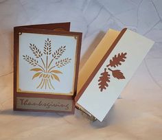 two greeting cards with the words thank you and an oak leaf design on one card