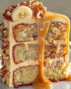 a piece of cake with bananas and caramel drizzled on the top