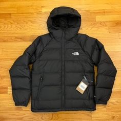 The North Face Hydrenalite Hoodie Lightweight, Warm And Comfy. Men's Medium. Fits True To Size. New With Tags, 100% Authentic. 600 Down Fill Insulation. The North Face Long Sleeve Winter Puffer Jacket, The North Face Long Sleeve Puffer Jacket For Winter, Black Hooded Puffer Jacket For Hiking, The North Face Hooded Nylon Outerwear, The North Face Black Hooded Jacket For Outdoor, The North Face Long Sleeve Puffer Jacket For Outdoor, Black The North Face Hooded Jacket For Outdoor, The North Face Winter Outerwear With Detachable Hood, Hooded The North Face Puffer Jacket For Fall