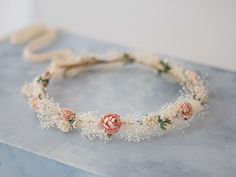 A whimsical flower crown in beautiful tones of blush, beige, ivory and green. Thanks to the use of paper flowers and preserved baby's breath, the crown is durable. Dried baby breath adds lightness to the composition. It is a special touch to your bohemian look. A flower crown is more beautiful than the pictures. Is perfect for garden wedding. Head circumference: one size fits all (adjustable) / fits adults and older children If the crown should fit the baby, after buying please give head circumference The gypsophila was preserved thanks to a glycerin solution. This method of drying gypsophila makes the plant durable, slightly moistened, elastic and does not crumble. The plants preserved in glycerin last at least a year. We offer customized accessories, matching the floral crown. Here you c Crown For Wedding, Wedding Peach, Whimsical Flower, Crown Baby, Flower Halo, Floral Crowns, Baby Breath, Flower Comb, Peach Blush