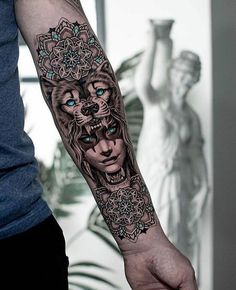 a person with a tattoo on their arm