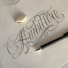 an artistically designed piece of paper with the word artisan written in cursive writing