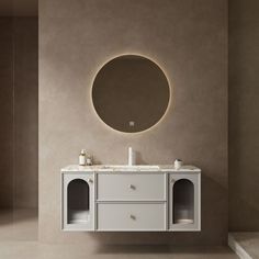 a bathroom with a round mirror above the sink