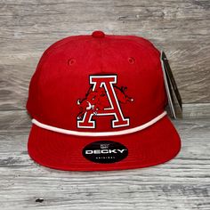 Our Pvc Patch Is A Waterproof, Rugged, And Clean Looking Design. You Can Bet That This Patch Will Look Vibrant For Years To Come. We Only Use The Highest Quality Products And Headwear. We Believe That Our Pvc Patches Beat Out Any Other Type Of Patch Offered On A Hat. Design: Arkansas Razorbacks Jumping Hog Hat: Decky Color: Red/ White Soft-Structured, Five-Panel, High-Profile 70/30 Cotton/Nylon Adjustable Plastic Snapback Slight Curve, Is Adjustable Either Way Hat Size: 7 - 7 3/4 Nike Baseball Cap Snapback, Nike Adjustable Snapback Baseball Cap, Nike Adjustable Snapback Hat, Nike Adjustable Snapback Hat With Curved Brim, Nike Casual Adjustable Snapback Hat, Casual Nike Adjustable Snapback Hat, Nike Adjustable Snapback Trucker Hat, Nike Adjustable Trucker Hat, Adjustable University Red Snapback Hat