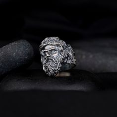 This elegant and meaningful men's ring features a finely crafted Zeus king of the gods ring in gleaming sterling silver.   The Greek Gods Mythology ring is designed with a masculine touch, making it a perfect accessory for men of faith who want to wear a symbol of their beliefs with style and grace. The ring is sized to be noticeable yet not overpowering, making it suitable for both everyday wear and special occasions. * Product Details * * Material: High Quality Solid 925 Sterling Silver. * Finish : Gold, Silver, Oxidized. Gold : 14K Gold Plated Sterling Silver. Silver : 14K White Gold Plated Sterling Silver. Oxidized : Black Rhodium Plated Sterling Silver. * All of our products are custom made to order. * There are no allergens such as nickel in our products. * We carefully prepare it by Men Of Faith, Gods Mythology, Greek Mythology Gods, Cleaning Silver Jewelry, Men Ring, Gifts For Your Boyfriend, Black Rhodium, Men's Ring, Style And Grace