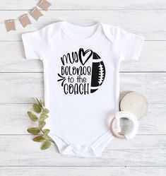 Grab this fun football baby bodysuit to announce your pregnancy, give at that next baby shower, or to support your coach on game day! Made specifically with the coach's kid in mind, these bodysuits will get everyone excited for the football season and remind the coach how much they are loved by the whole family. ⚜️Care Instructions: - Turn bodysuit inside out and wash on cold - Tumble dry on low temperature - Do not iron directly on the lettering FOLLOW US Pinterest: @thegamedayfamily Instagram: Basketball Baby, Baby Shower Announcement, Game Day Outfit, Baseball Baby, Coach Gift, Wife And Kids, Sports Svg