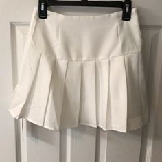 Nwt Romwe Juniors S Cream Colored Lined Mini Skirt. Brand New Never Worn! So Cute With Pleated Bottom. Side Zipper. Top To Bottom Is 15”. 28” Waist. White High-waist Pleated Skirt, White Pleated High Waist Skirt, Elegant High Waist White Tennis Skirt, Elegant White Mini Skirt With Pleated Hem, Elegant White Pleated Mini Skirt, Elegant White Pleated Skort, White Flared Mini Skirt With Pleated Hem, White Bottoms With Pleated Hem In Short Length, White Pleated Flared Mini Skirt