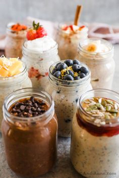 several jars filled with different types of food