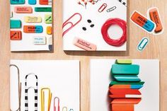 there are many different items on the table together, including magnets and paper clips