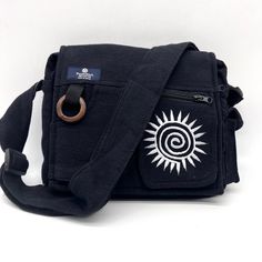 Puzzlestack’s Lukla Black Embroidered Messenger Bag Is A Compact Yet Voluminous Bag. Along With Its Multiple Pockets Used For Storage, It Includes A Large Flap Closure With Velcro. Starting Off With The Two Front Pockets, Open Up The Flap To Find The Main Compartment Following The Large Extra Pocket, And Even A Cute Mini Side Pocket! Make Travel Hands-Free With This Spacious Bag. Express Yourself With 5 Different Hand Embroidered With Thread Designs To Choose From! Not Only Is This Bag Sustainab Embroidered Black Satchel Shoulder Bag, Embroidered Black Shoulder Bag For Travel, Black Embroidered Bag For Daily Use, Black Embroidered Bags For Daily Use, Everyday Black Embroidered Bag, Black Embroidered Rectangular Shoulder Bag, Black Embroidered Travel Bag, Black Embroidered Satchel For Daily Use, Black Embroidered Satchel Shoulder Bag