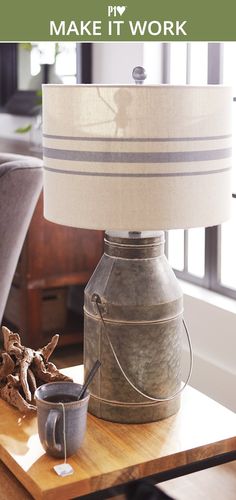 a lamp sitting on top of a wooden table