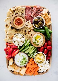 a platter filled with different types of appetizers