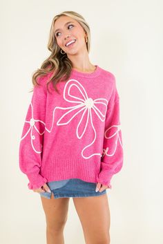 Ribbed detailing Ruffle on cuffs of sleeves Oversized Bows on front and sleeves Soft 74% Acrylic; 22% Polyester; 4% Spandex SIZES: SMALL MEDIUM LARGE Unleash your inner fashionista with our Oversized Bow Knit Sweater! Made with a soft pink fabric, this sweater features a large, playful bow for a touch of fun and flair. Perfect for staying cozy and stylish on chilly days. SIZE XS S M L XL 2XL 3XL FITS A SIZE 2-4 6-8 10-12 14-16 18-20 22-24 26-28 Affordable Fun Pink Sweater, Knit Bow, Drop Sleeve, Bow Sweater, Pink Round, Bow Pattern, Dress Clip, Drop Shoulder Sweaters, Cozy Knit