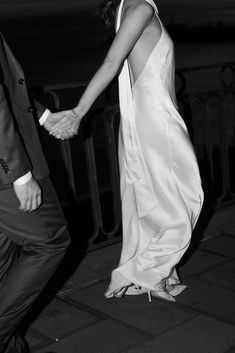 black and white photograph of a couple holding hands