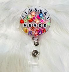 This Student Nurse Resin Badge Reel is perfect for all baby nurses in your life, or even a special gift for yourself! It is the perfect edition to any scrubs to make your shift more fun.  -Each item is made to order -Each item differs slightly (including charms inside) -Badge Reels designed with belt clip as seen above  Feel Free to reach out with any questions or concerns, and we would love to help you out!! Not Responsible for any damage of the badge reel itself, only responsible for damage to the resin front -if any issues, feel free to contact me!! Playful Multicolor Badge Reel For Gifts, Personalized Fun White Badge Reel, Playful Multicolor Badge Reel As Gift, Personalized White Fun Badge Reel, Personalized Fun Badge Reel For Hobbies, Personalized Fun Badge Reel For Hobby, Playful White Badge Reel For Gift, Playful White Badge Reel For Gifts, Customizable Novelty Multicolor Badge Reel