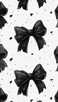 black and white bows with hearts on the bottom are featured in this seamless pattern