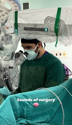 two surgeons in scrubs and masks operating on an iv machine with the words sounds of surgery