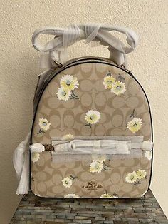 Top Rated JORDYN BACKPACK IN SIGNATURE CANVAS WITH DAISY PRINT (COACH C2856), Women's Bags & Handbags Coach Backpack Jordyn, Coach Backpack Women, Mochila Coach, Coach Backpack, Luxury Backpack, Backpack Women, Signature Canvas, Daisy Print, Baby Bag