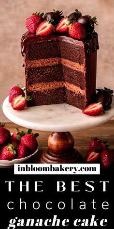 chocolate cake with strawberries on top and the words, the best chocolate ganache cake