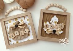 two wooden framed pictures with words that spell out the word fall and an ornament