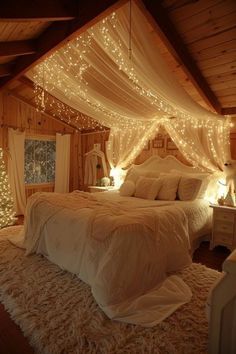 a bedroom with lights on the ceiling and a bed in the middle that has a canopy over it