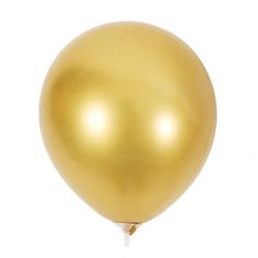 a gold balloon floating in the air