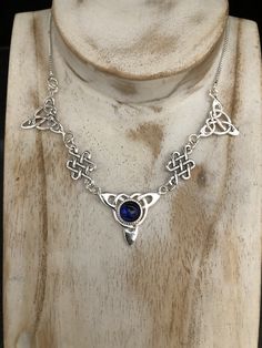 "I've fabricated a Victorian Bohemian style necklace with a center Celtic knot which features a center 10mm natural cabochon gemstone of your choosing, with two Trinity component pieces on either side, and two Celtic stenciling components to compliment the trinity knots. The sterling chain of 15 inches is soldered to each end making the approximate length of this piece just a bit over 18\" total. The chain will have a sturdy lobster claw. If you prefer a faceted gemstone, within a heavy 4 prong Artisan Birthstone Necklace For Gifts, Artisan Birthstone Pendant Necklace, Amethyst Cabochon Necklace For Gift, Spiritual Sterling Silver Necklace With Round Stone, Spiritual Cabochon Necklaces, Spiritual Cabochon Necklace, Adjustable Cabochon Round Pendant Necklace, Adjustable Cabochon Necklace As Gift, Spiritual Necklaces With Round Natural Stones