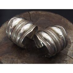 Antique Silver Afghan Cuff Pair Size approx. 6 1/2" to 7 1/2" Sold as a pair 80% or higher silver content Origin is Afghanistan Provenance: from the Collection of Lois Sherr Dubin. Lois Sherr Dubin wrote The History of Beads: From 30,000 B.C. to the Present (Abrams, 1987; reissued in paperback in 2004 and updated in 2009 as The History of Beads: From 100,000 to the Present), a beloved classic study and reference on the subject that has been published in five languages. Scholar, Researcher and Co Traditional Handmade Sterling Silver Bracelet For Formal Occasions, Polished Antique Sterling Silver Bracelet, Traditional Adjustable Cuff Sterling Silver Bracelet, Traditional Adjustable Cuff Bracelet With Polished Finish, Ceremonial Oxidized Finish Cuff Bracelet, Traditional Adjustable Sterling Silver Cuff Bracelet, Adjustable Traditional Cuff Bracelet With Polished Finish, Traditional Sterling Silver Adjustable Cuff Bracelet, Vintage Sterling Silver Ceremonial Bracelets