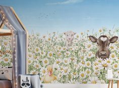 there is a wall mural with animals in the field and daisies on the ground