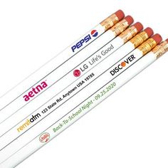 four pencils are lined up next to each other on a white surface with the words pepla written in red