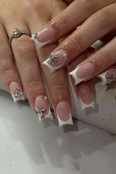 short french tip nails with charms Cross Nail Charm Nails, Short Acrylic Nails Designs Charms, French With Cross Nails, White French Tip With Cross Charm, Short Acrylic Nails Cross, Nail Inspo Cross Charm, French Tips With Charms Short, French Tip Nails With Cross Charm, Letter Charms On Nails