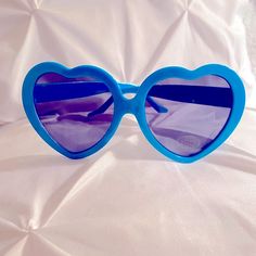 Bew Blue Heart Sunglasses Blue Fun Sunglasses With Tinted Lenses, Playful Blue Sunglasses For Party, Blue Tinted Fun Sunglasses, Fun Blue Tinted Sunglasses, Playful Blue Party Sunglasses, Retro Blue Sunglasses For Spring, Cute Blue Sunglasses For Summer, Blue Retro Plastic Sunglasses, Fun Blue Sunglasses For Parties