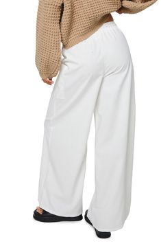 Cotton and linen add airy ease to slouchy wide-leg cargo pants topped with a comfortable elastic-drawstring waist. 70% cotton, 30% linen Machine wash, line dry Imported Spring Cotton Wide Leg Pants With Cargo Pockets, Summer Cotton Wide-leg Cargo Pants, Cotton Wide Leg Pants With Cargo Pockets For Spring, Chic Baggy Cotton Parachute Pants, Summer Wide Leg Cargo Pants For Loungewear, Wide Leg Summer Cargo Pants For Loungewear, Chic Baggy Cotton Cargo Pants, Wide Leg Cargo Pants With Pockets For Day Out, Linen Cargo Pants With Elastic Waistband For Loungewear