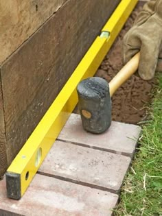 a baseball bat sitting on top of a wooden bench