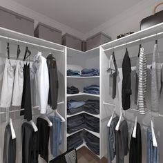 an open closet with clothes hanging in it