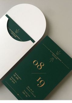 a green and white wedding card with the number nineteen on it's front cover