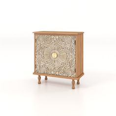 a wooden cabinet with an intricate design on the front and side panel, in white background