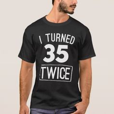 a man wearing a t - shirt that says i turned 25 twice