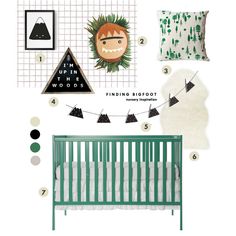 a baby's room with green and white decor, including a crib bed